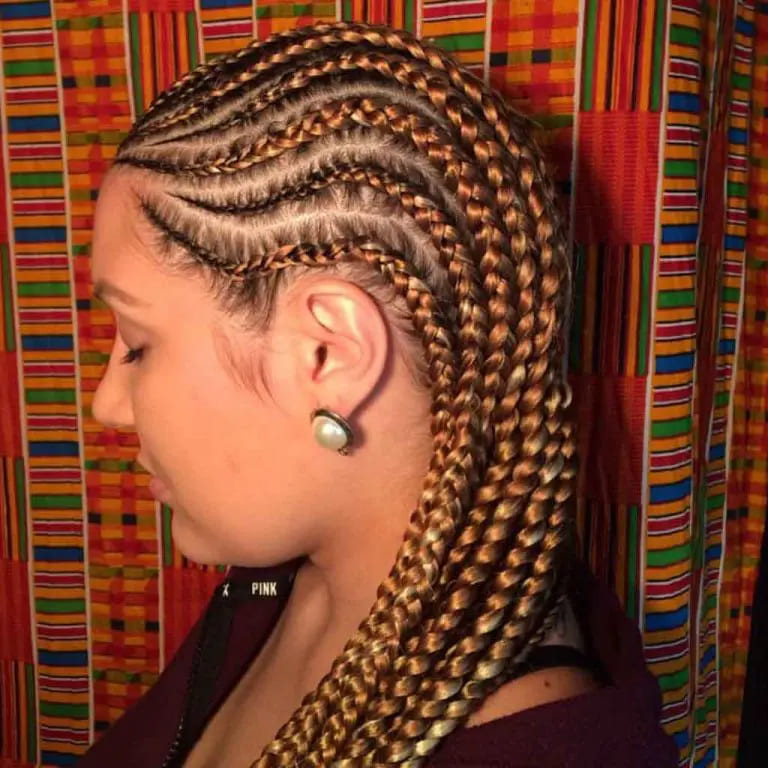 12 Twistiest Swirl Cornrows to Wow the Crowd 13 Side Swirl Braids With Copper Highlights