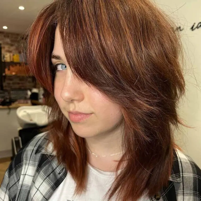 10 Top Balayage Wolf Cut Ideas For Women 3 70s Style Balayage Wolf Cut With Side Swept Bangs