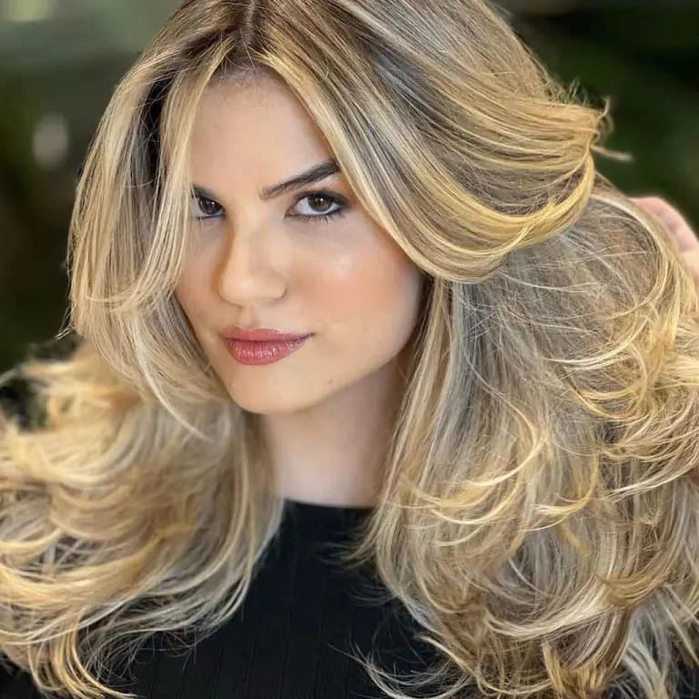 12 Butterfly Wolf Cut Ideas For Women 6 Beige Blonde Choppy Layered Medium Butterfly Wolf Cut