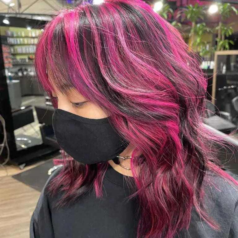 10 Sassy Wavy Wolf Cuts With Bangs 2 Black-Pink Wavy Wolf Cut With Bangs