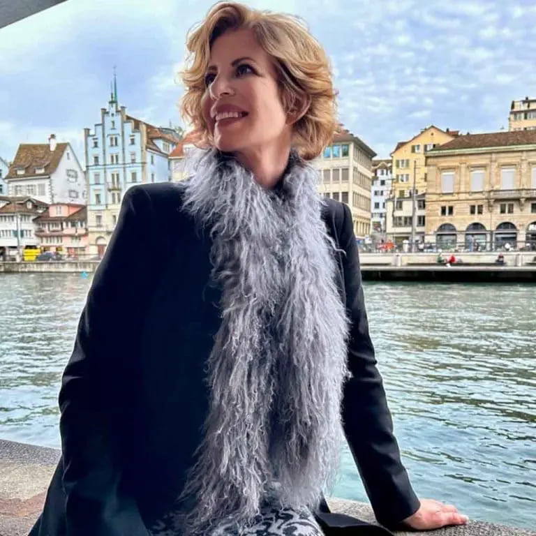 10 Stylish Haircuts for Women Over 50 9 Blonde Fluffy Wavy Bob Cut