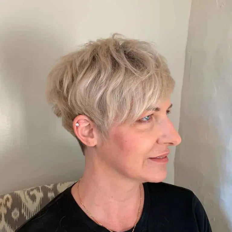 12 Easy-Going Short Cropped Hairstyles 5 Blonde Pixie Cut With Fringe