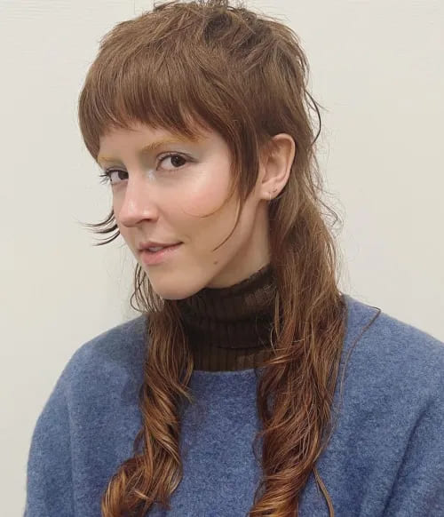 12 Modern Mullet Haircuts for Women 7 Charming Mullet with Face-Framing Bangs