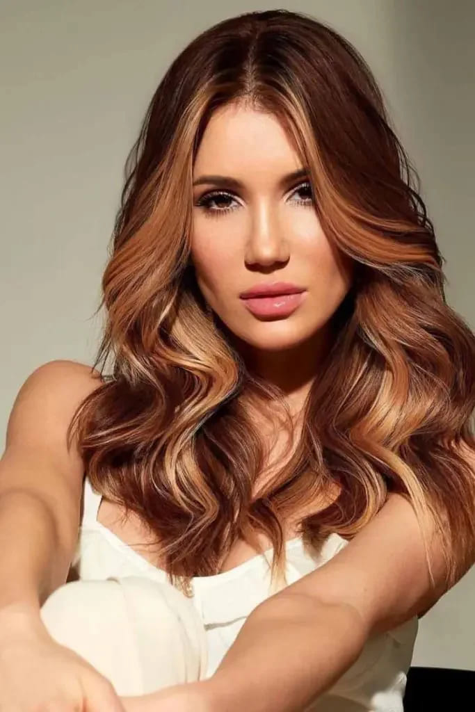 10 Fiery Chestnut Hair Color Ideas 5 Chestnut Caramel Highlights on Long Wavy Hair