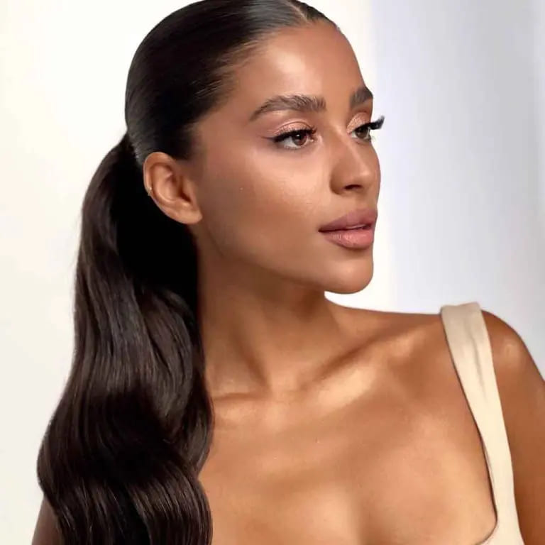 10 Elegant Hairstyles for Wavy Hair for women 4 Classic Wavy Ponytail on Black Hair