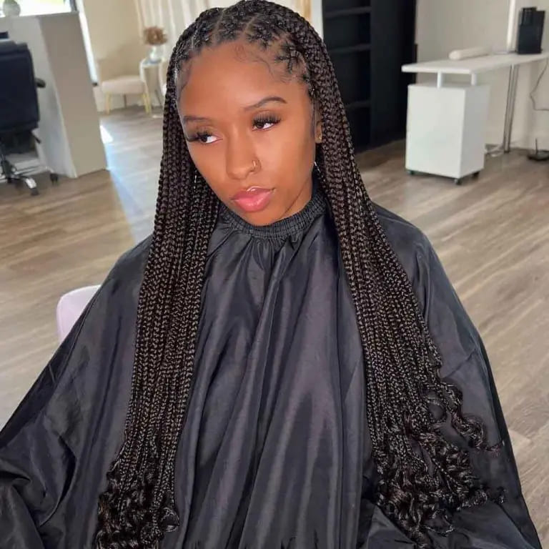 10 Stunning Hairstyles for Black Women 10 Crisscross Knotless Fulani Braids on Long Black Hair