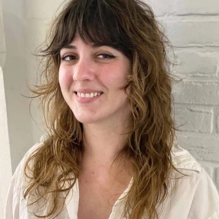 10 Top Balayage Wolf Cut Ideas For Women 5 Curly Mullet Wolf Cut With Balayage and Curtain Bangs