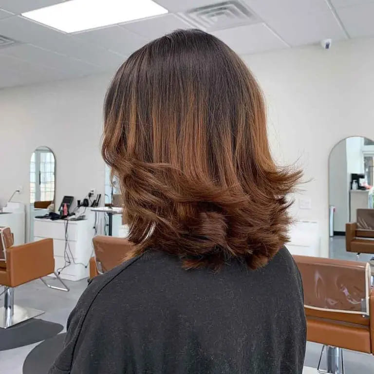 10 Brown Wolf Cut Ideas for Women to Elevate Your Style! 11 Dark and Almond Brown Combination Short Wolf Cut With Wavy Ends