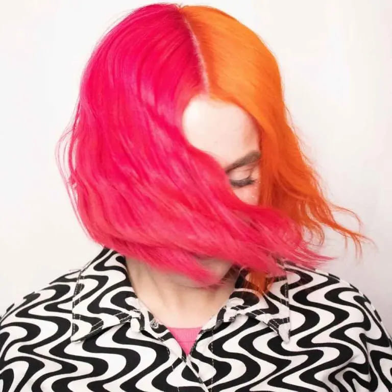 16 Gemini Hair Color Ideas to Embrace Dual-Toned Brilliance 2 Fiery Colored Short Wavy Gemini Hair