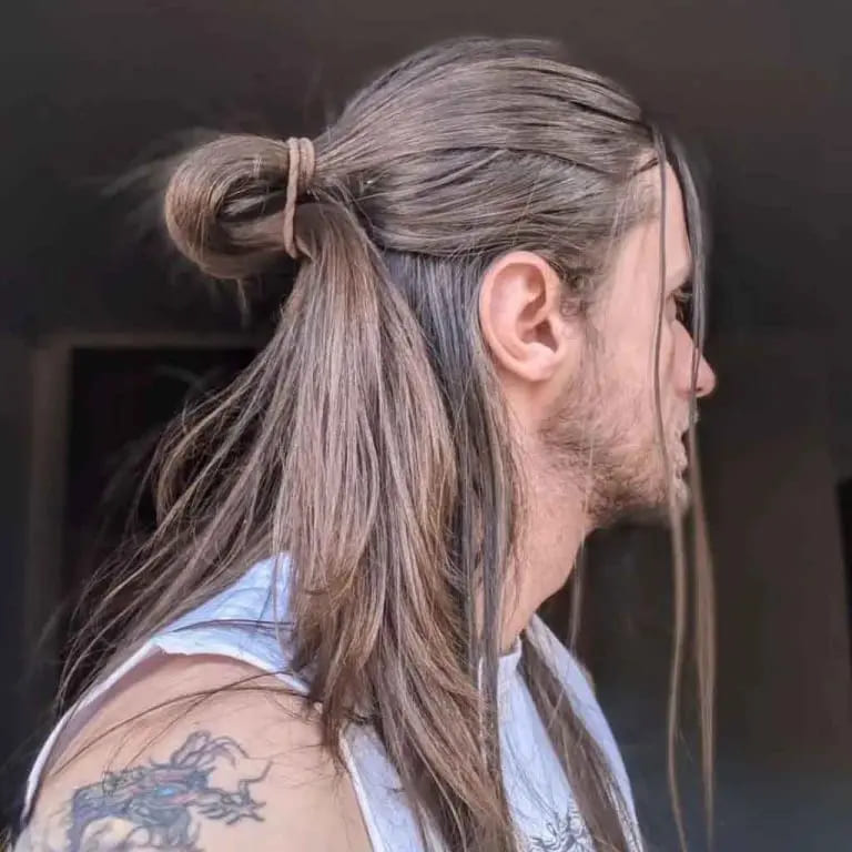 12 Dapper Hairstyles for Long-Haired Men 7 Half Man Bun on Long Light Brown Hair