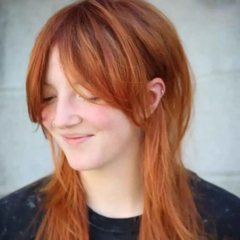 10 Spicy Ginger Wolf Cut Ideas for women 7 Light Ginger Jellyfish Wolf Cut With Bottleneck Bangs on Long Hair
