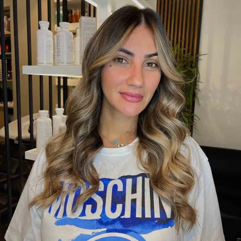 10 Best Wolf Cuts With Curtain Bangs 9 Long Balayage Octopus Wolf Cut with Curtain Bangs