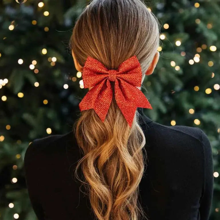10 Christmas Hairstyles for You to Rock This Christmas. 3 Long Bronde Wavy Ponytail With Big Christmas Bow