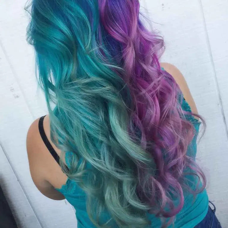 16 Gemini Hair Color Ideas to Embrace Dual-Toned Brilliance 8 Long Layered Wavy Amethyst Purple and Sky Blue Gemini Hair