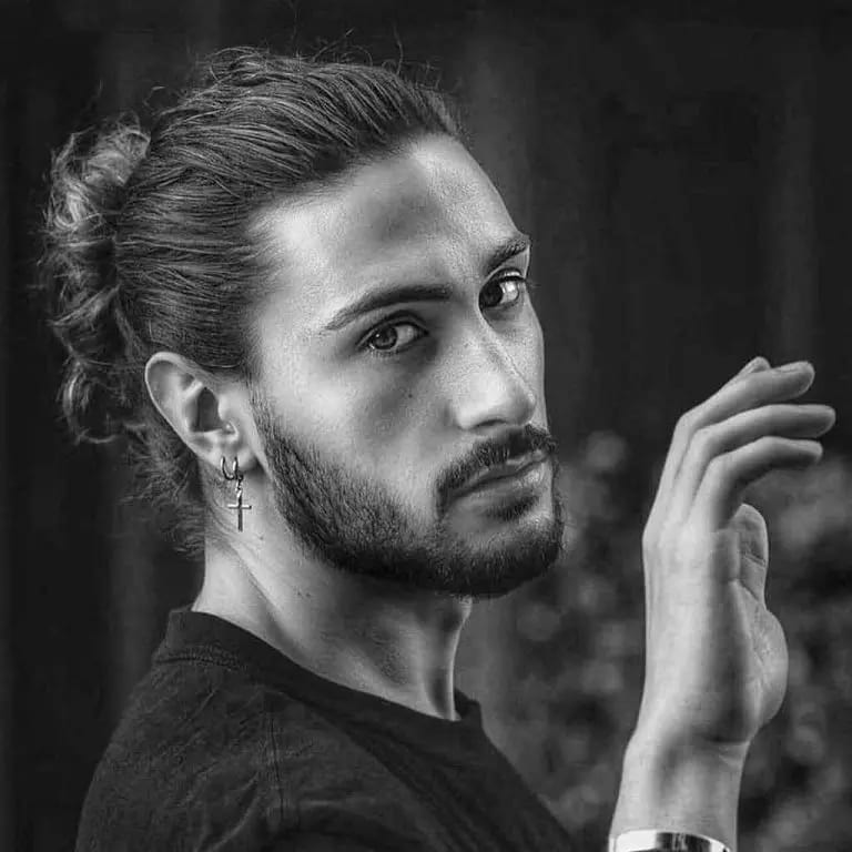 12 Dapper Hairstyles for Long-Haired Men 8 Long Messy Curly Man Bun