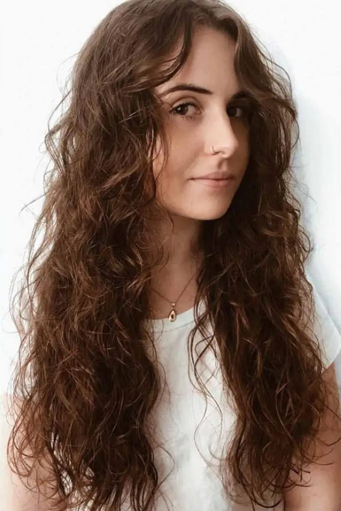 10 Fall Hair for women Trends You Must Try 8 Long, Natural Curls With Subtle Layers