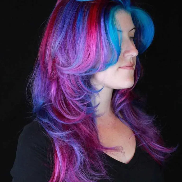 12 Butterfly Wolf Cut Ideas For Women 7 Long Shag Mullet Butterfly Wolf Cut With Multi-Colored Highlights