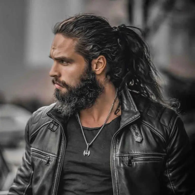 12 Dapper Hairstyles for Long-Haired Men 11 Long Tousled Wavy Hair With Ponytail