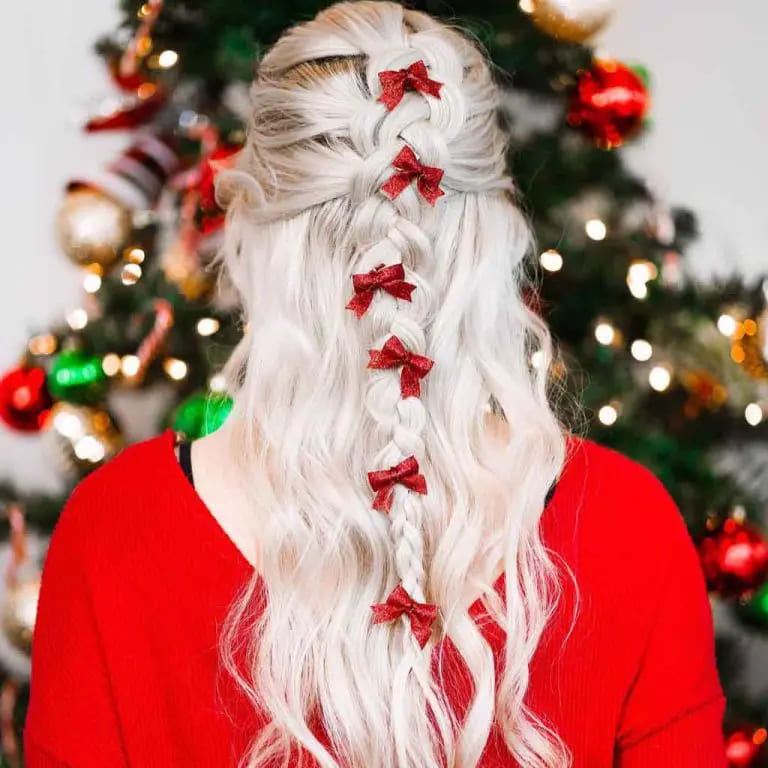 10 Christmas Hairstyles for You to Rock This Christmas. 8 Long Wavy Bleached Blonde Hair With a Bow-Laden French Braid