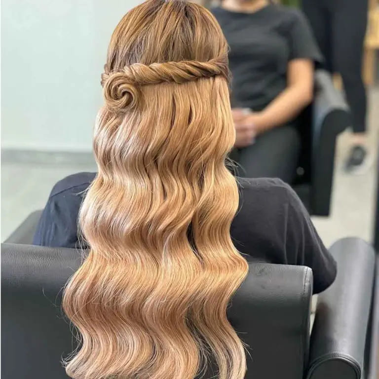 10 Elegant Hairstyles for Wavy Hair for women 5 Long Wavy Blonde Half-Up Braided Hairstyle