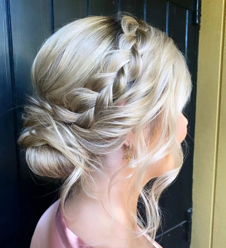 12 Stunning Hairstyles for Bridesmaids 11 Low Bun With Side Pull-Through Braid