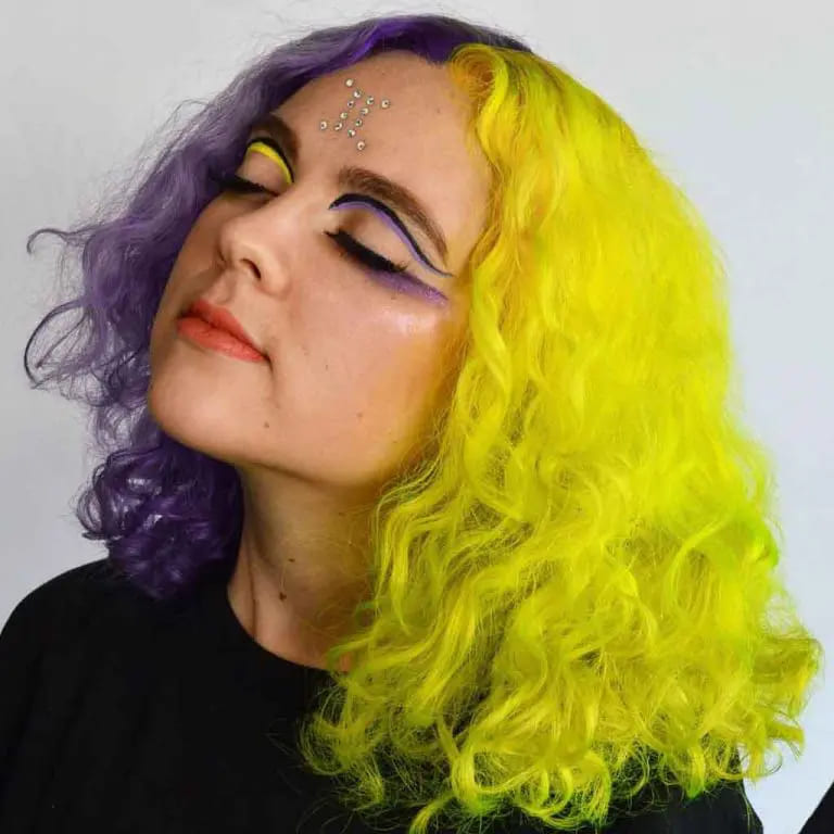 16 Gemini Hair Color Ideas to Embrace Dual-Toned Brilliance 7 Medium Curly Yellow and Iris Purple Gemini Hair