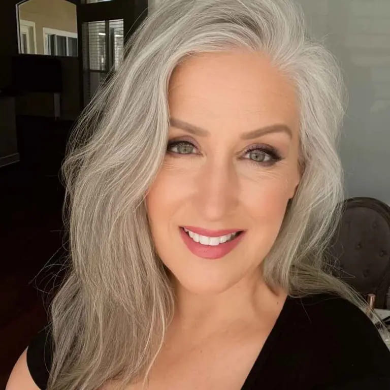 10 Stylish Haircuts for Women Over 50 7 Medium Wavy Silver Hair