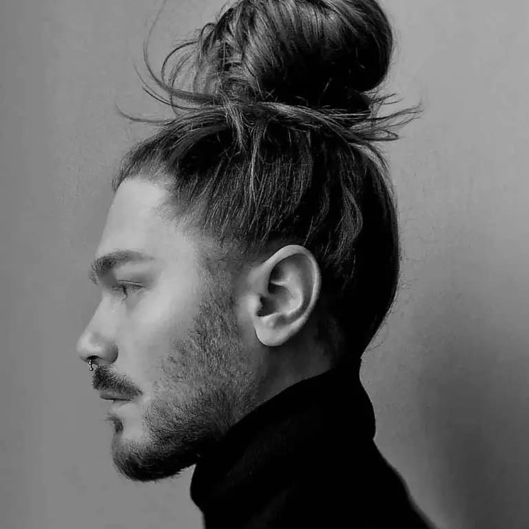 12 Dapper Hairstyles for Long-Haired Men 6 Messy Top Knot High Bun