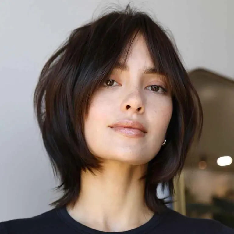 10 Short Wolf Cuts With Curtain Bangs 7 Mocha Brown Straight Wolf Cut With Face Layers and Curtain Bangs