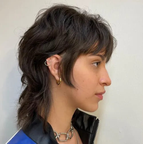 12 Modern Mullet Haircuts for Women 10 Modern Wolf Haircut with Long Bangs