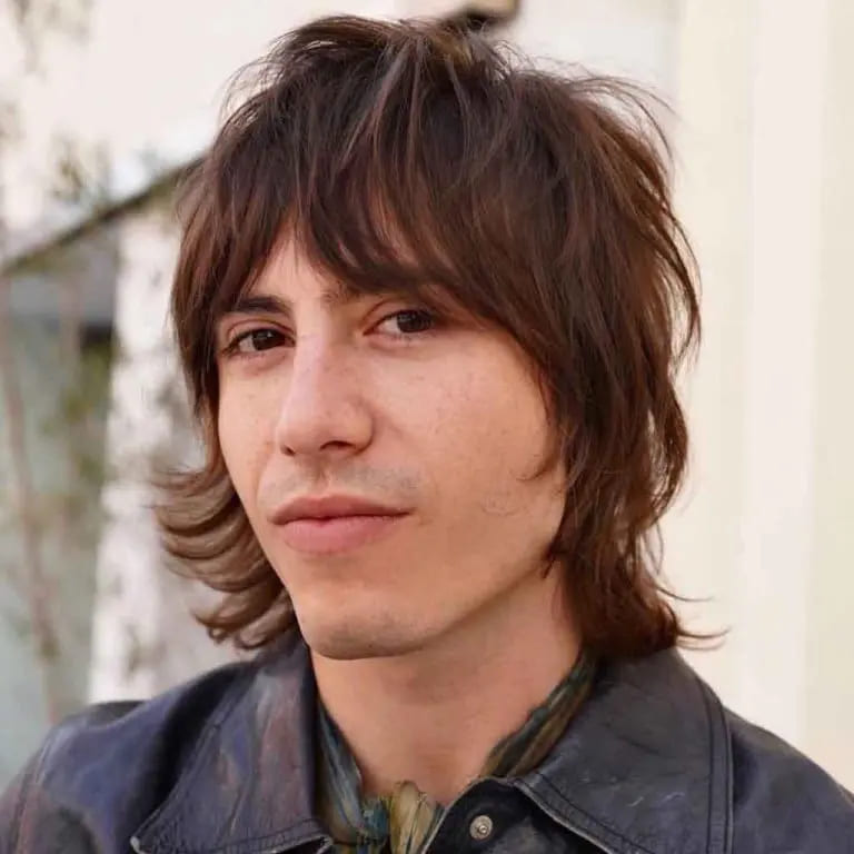 10 Stylish Wolf Cut Ideas For Men 11 Oasis Style Wolf Cut on Brown Hair