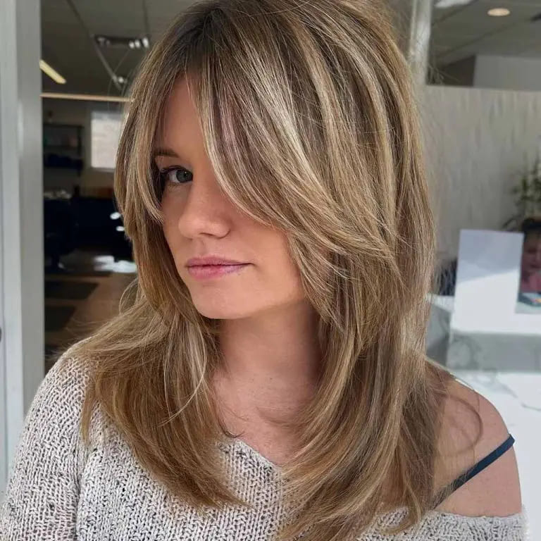 10 Top Balayage Wolf Cut Ideas For Women 7 Shaggy Wolf Cut With Blonde Balayage With Face Layers