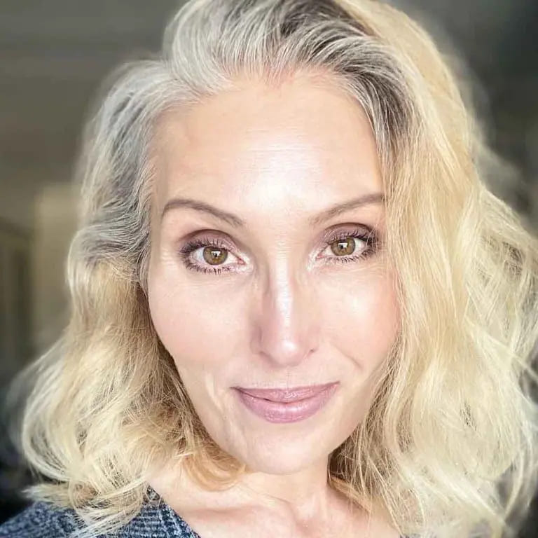 10 Stylish Haircuts for Women Over 50 5 Short Wavy Grey Hair With Blonde Highlights