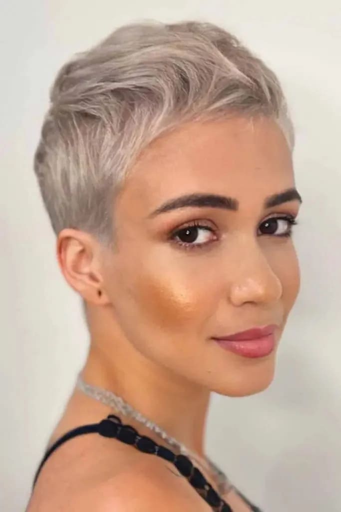 12 Best Edgy Short Haircuts For Fancy Look 6 Silver Pixie With Soft Waves