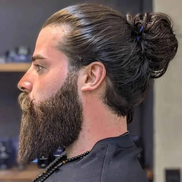 12 Dapper Hairstyles for Long-Haired Men 10 Slick Back Messy Hair Man Bun