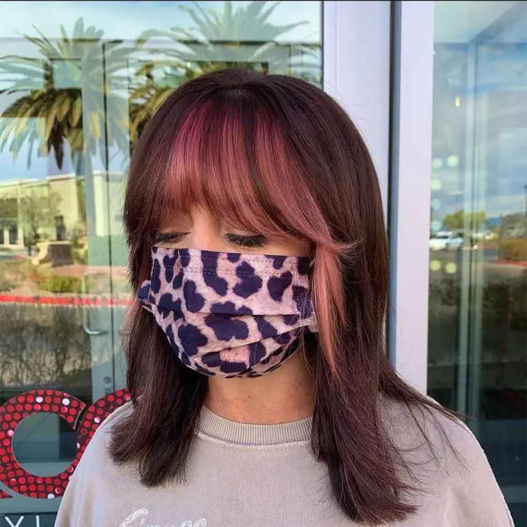 10 Wolf Cuts With Colored Bangs for Added Style 5 Straight Hair Brown Medium Wolf Cut With Peach Blunt Bangs