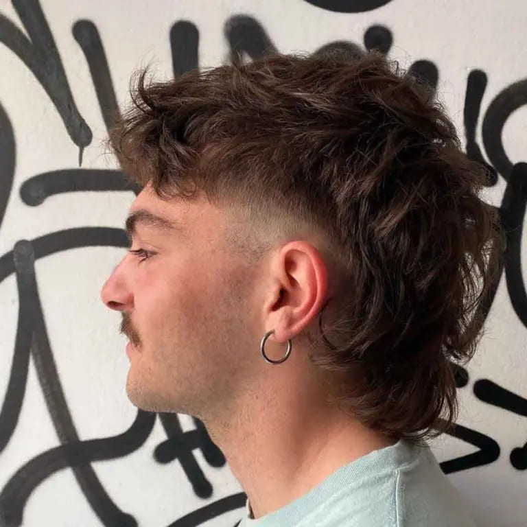 10 Stylish Wolf Cut Ideas For Men 8 Street-Style Wolf Cut Mullet