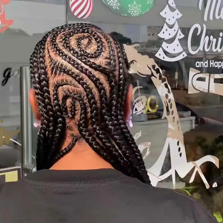 12 Twistiest Swirl Cornrows to Wow the Crowd 5 Swirl Cornrows With Long Knotless Braids