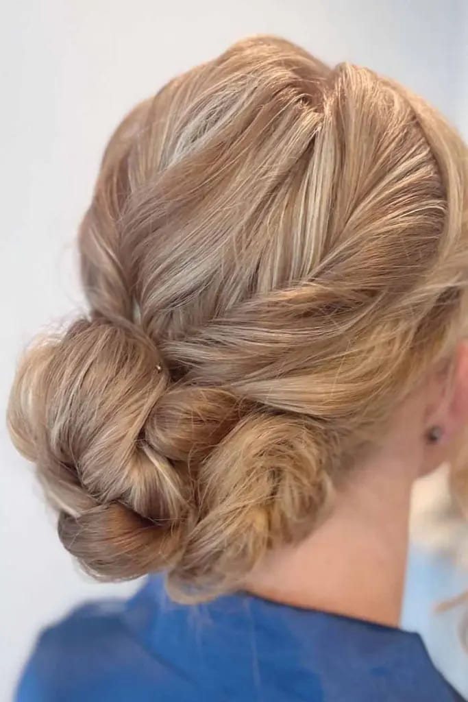 10 Elegant Long Hair Updos 4 Textured Double Twisted Bun
