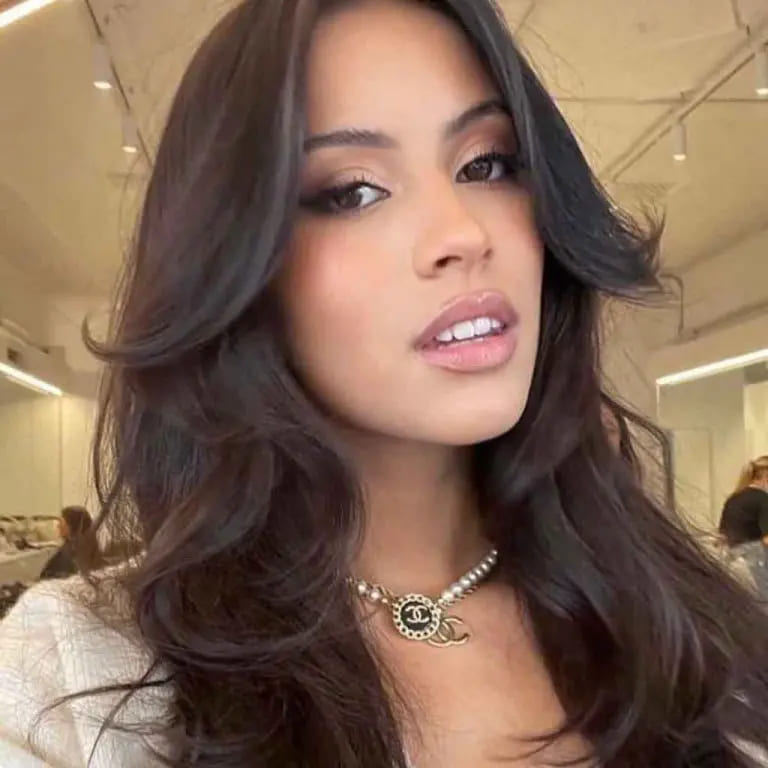 10 Hairstyles for Oval-Shaped Face 3 Deep Brunette Layered Cut