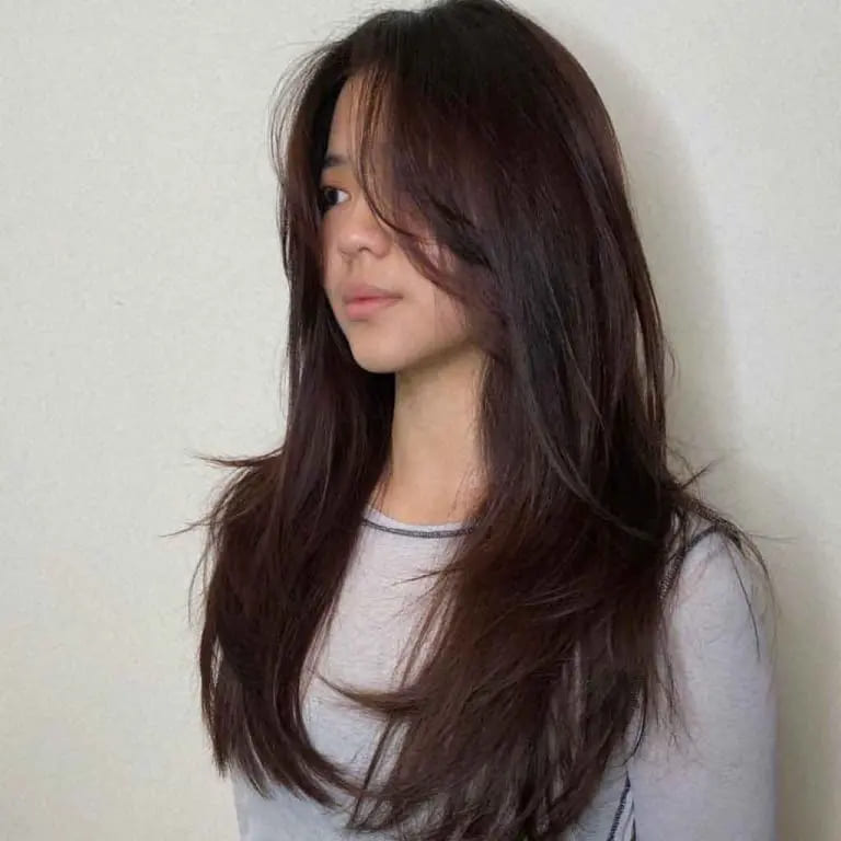 10 Hairstyles for Oval-Shaped Face 5 Long Face Framing Layered Cut on Straight Hair