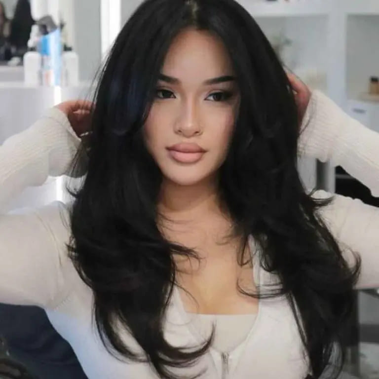 10 Hairstyles for Oval-Shaped Face 6 Medium Long Black Layered Hair