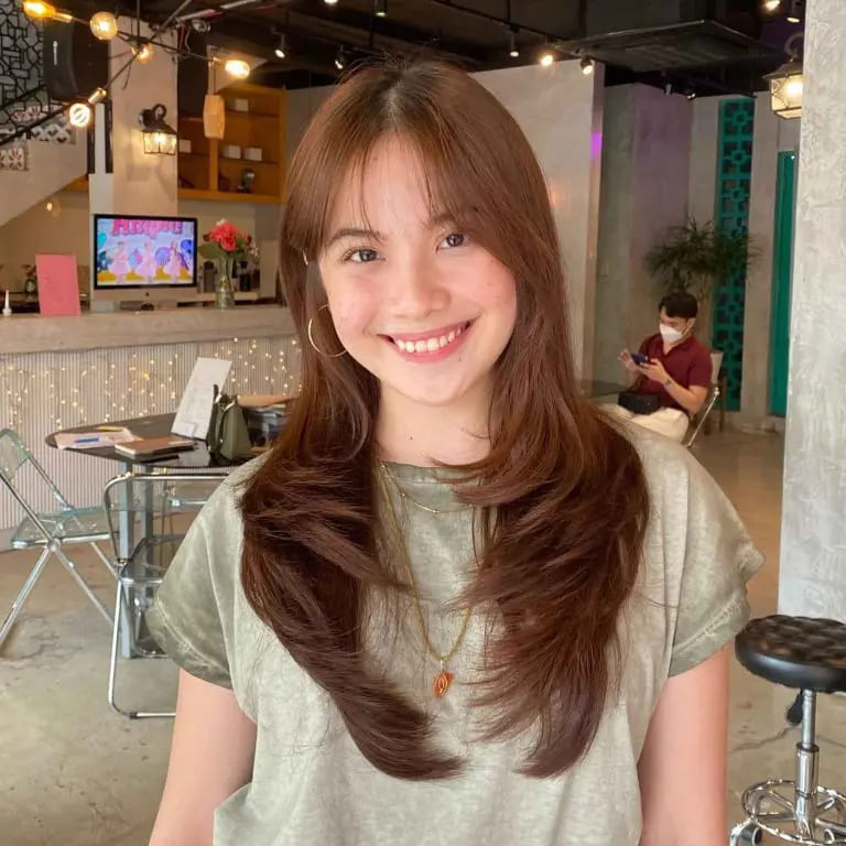 12 Stunning Korean Hairstyles for Women 10 Korean Style Brown Layered Hair With Wispy Bangs
