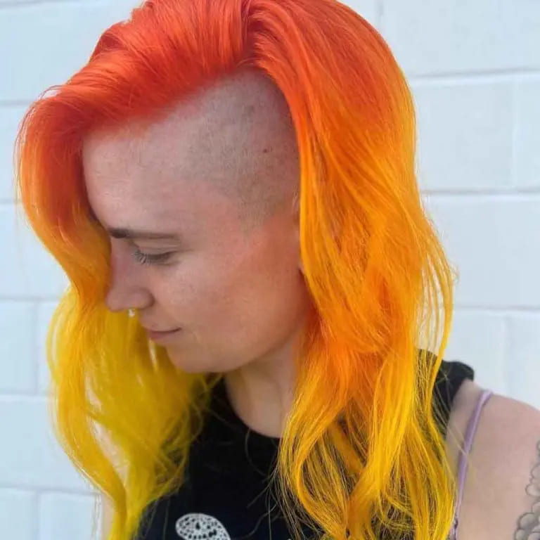 12 Edgy Side-Shaved Hairstyles to Stand Out 2 Half Shaved Buzz Cut With Medium Fire Hair Color