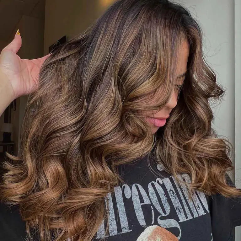 11 Best Hairstyles With Caramel Highlights 10 Long Fluffy Wavy Hair With Caramel Balayage