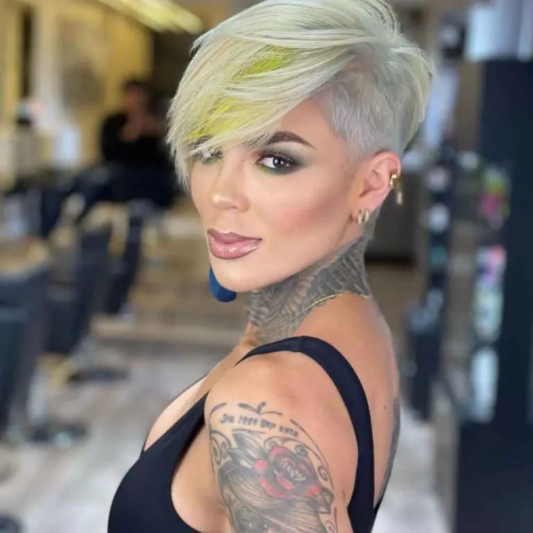 12 Edgy Side-Shaved Hairstyles to Stand Out 9 Side-Shaved Blonde Pixie Cut With yellow Highlights