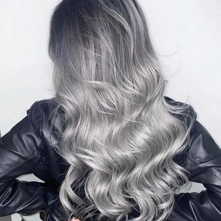 12 Shining Hairstyles With Silver Highlights 11 Long Hair With Beachy Waves With Silver Balayage