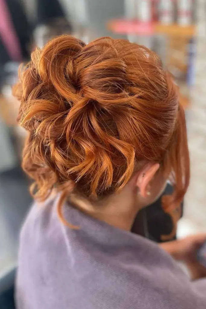 10 Elegant Long Hair Updos 8 Voluminous Curled Updo