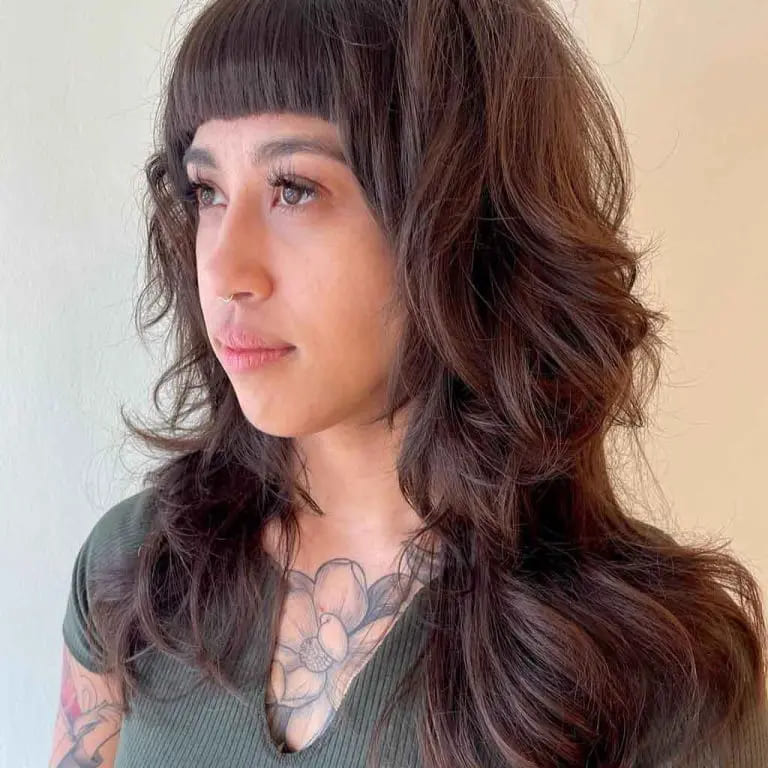 12 Butterfly Wolf Cut Ideas For Women 3 Wavy Coffee Brown Medium Butterfly Wolf Cut With Short Choppy Bangs