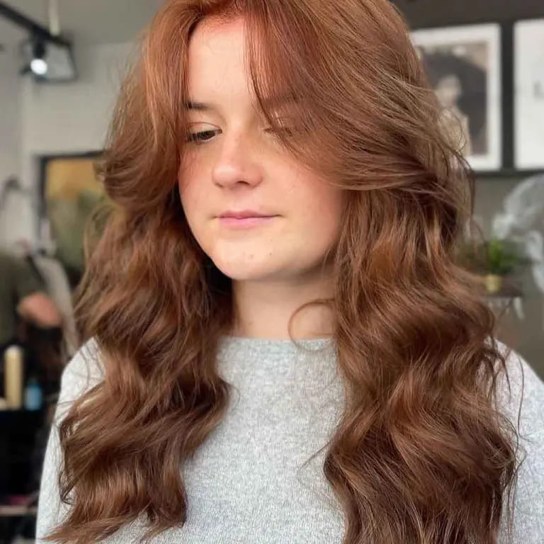 10 Wolf Cuts Without Bangs for women 11 Wavy Long Brunette Wolf Cut